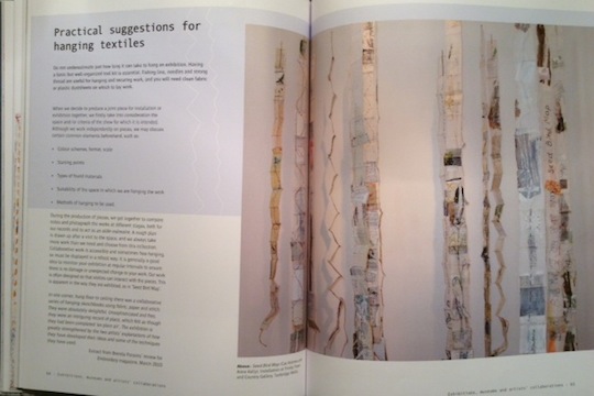 A page from Connected Cloth explaining how to hang fabric art